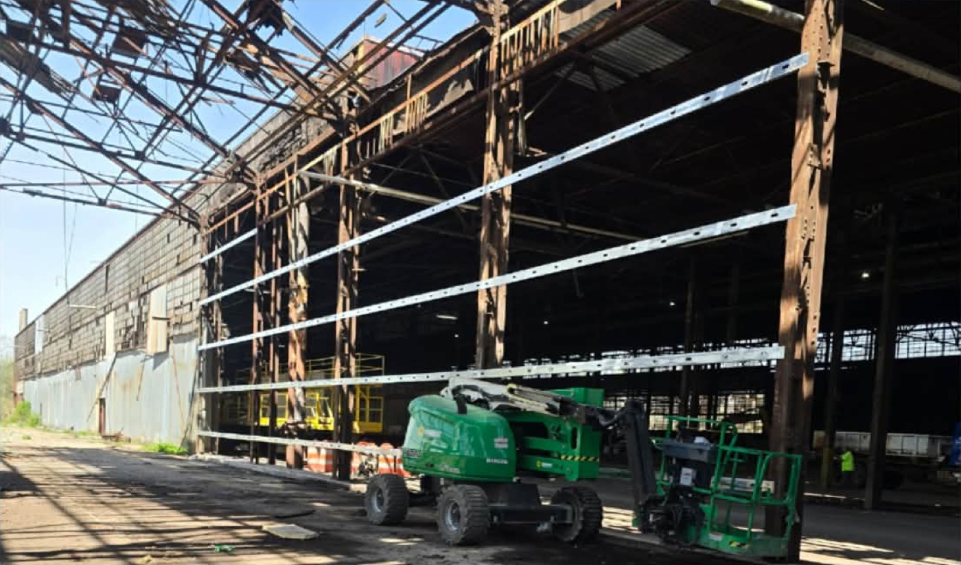 Commercial building structural renovation with boom lift